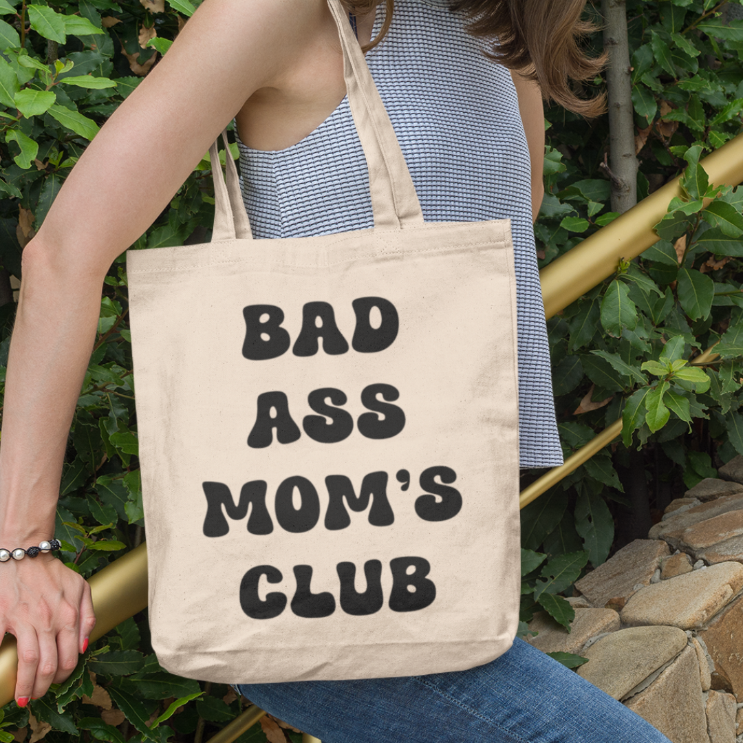 Mom's canvas tote bag featuring text with "BAD ASS MOM'S CLUB"