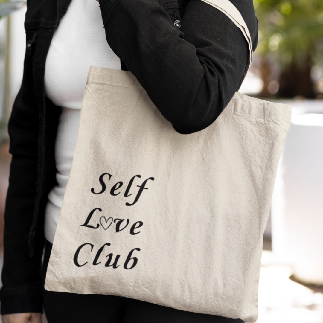 Double-sided minimalist eco tote bag with “Self Love Club” text printed on 100% organic reusable canvas
