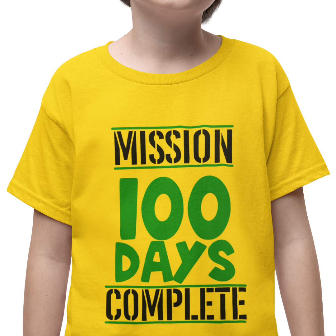 Closeup of a student wearing a yellow t-shirt with Mission 100 Days Complete text on a white background more colors more sizes