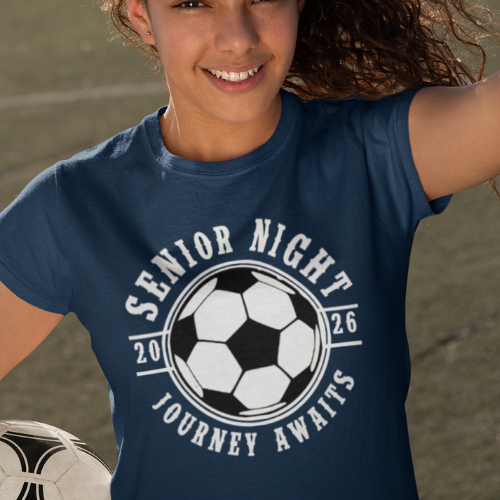 A High School senior wearing her  Navy Blue Class of 2026 varsity soccer Senior Night shirt.