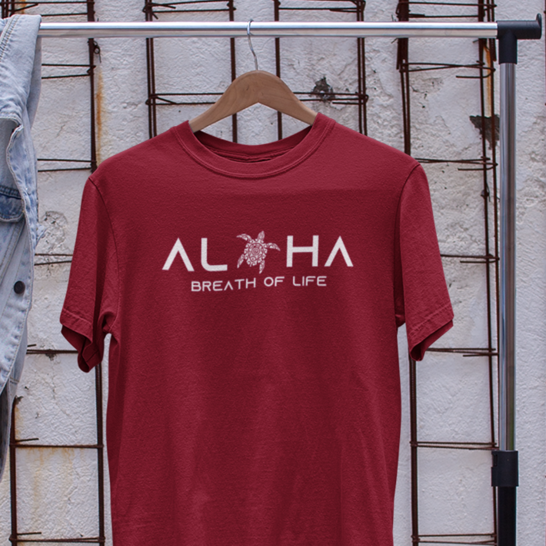 Aloha Breath of Life Island Vibe Tee in red. Front view featuring Hawaiian-inspired design. Colors may vary due to lighting.