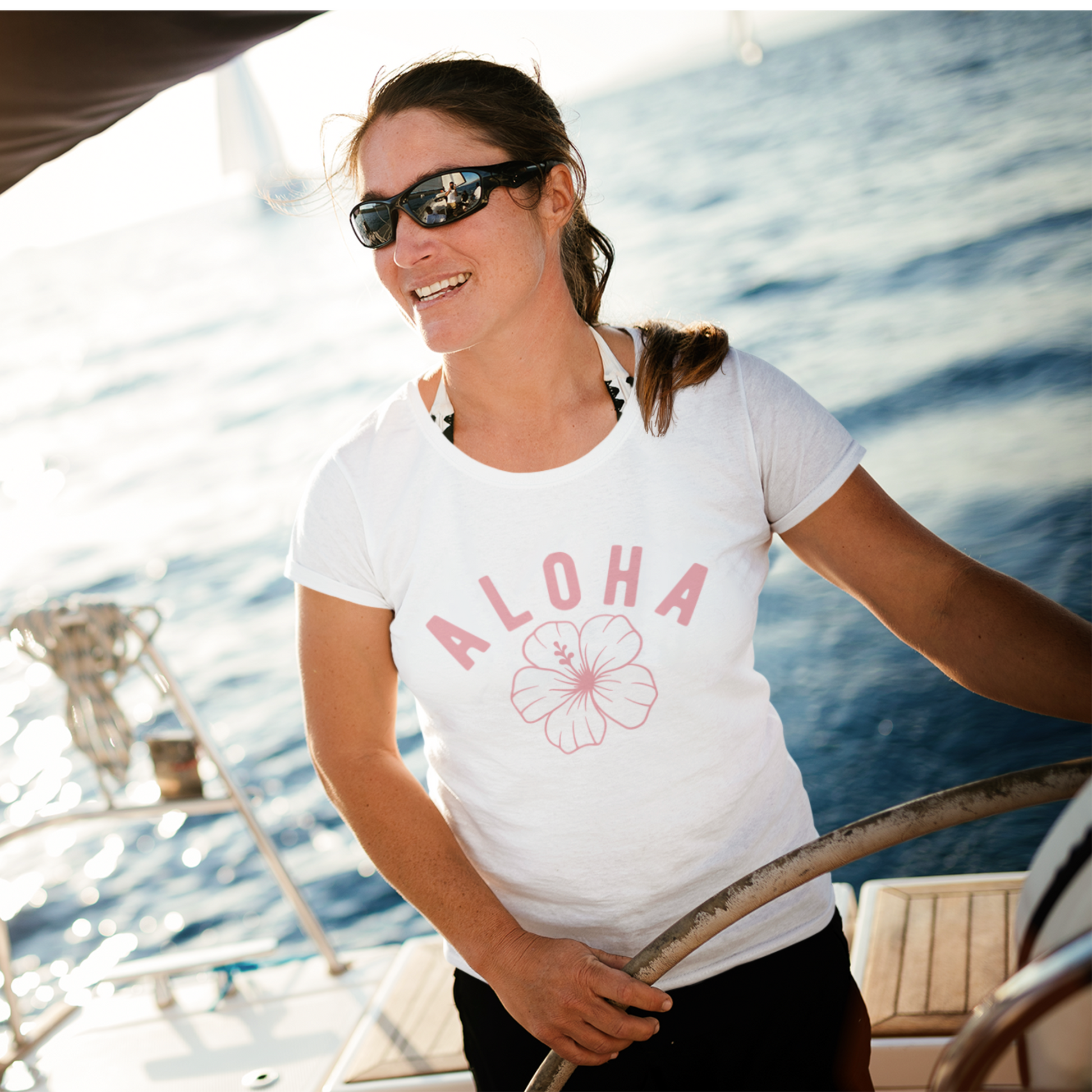 Aloha T-Shirt with Hibiscus Print In White. Tropical style for summer or everyday casual wear.