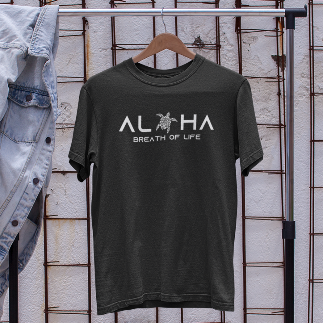 Aloha Breath of Life Island Vibe Tee in black. Front view featuring Hawaiian-inspired design. Colors may vary due to lighting.
