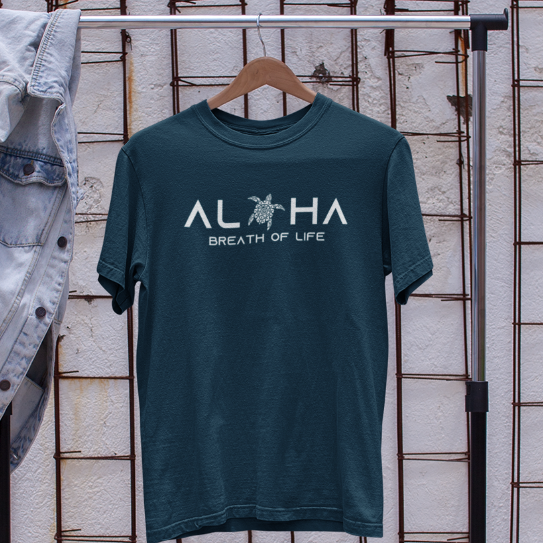 Aloha Breath of Life Island Vibe Tee in navy blue. Front view featuring Hawaiian-inspired design. Colors may vary due to lighting.