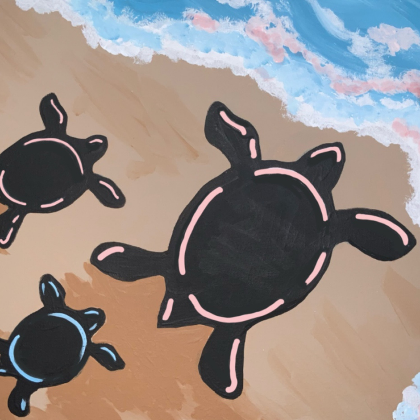 Black silhouettes of three sea turtles crawling across tan sand toward light blue ocean waves.