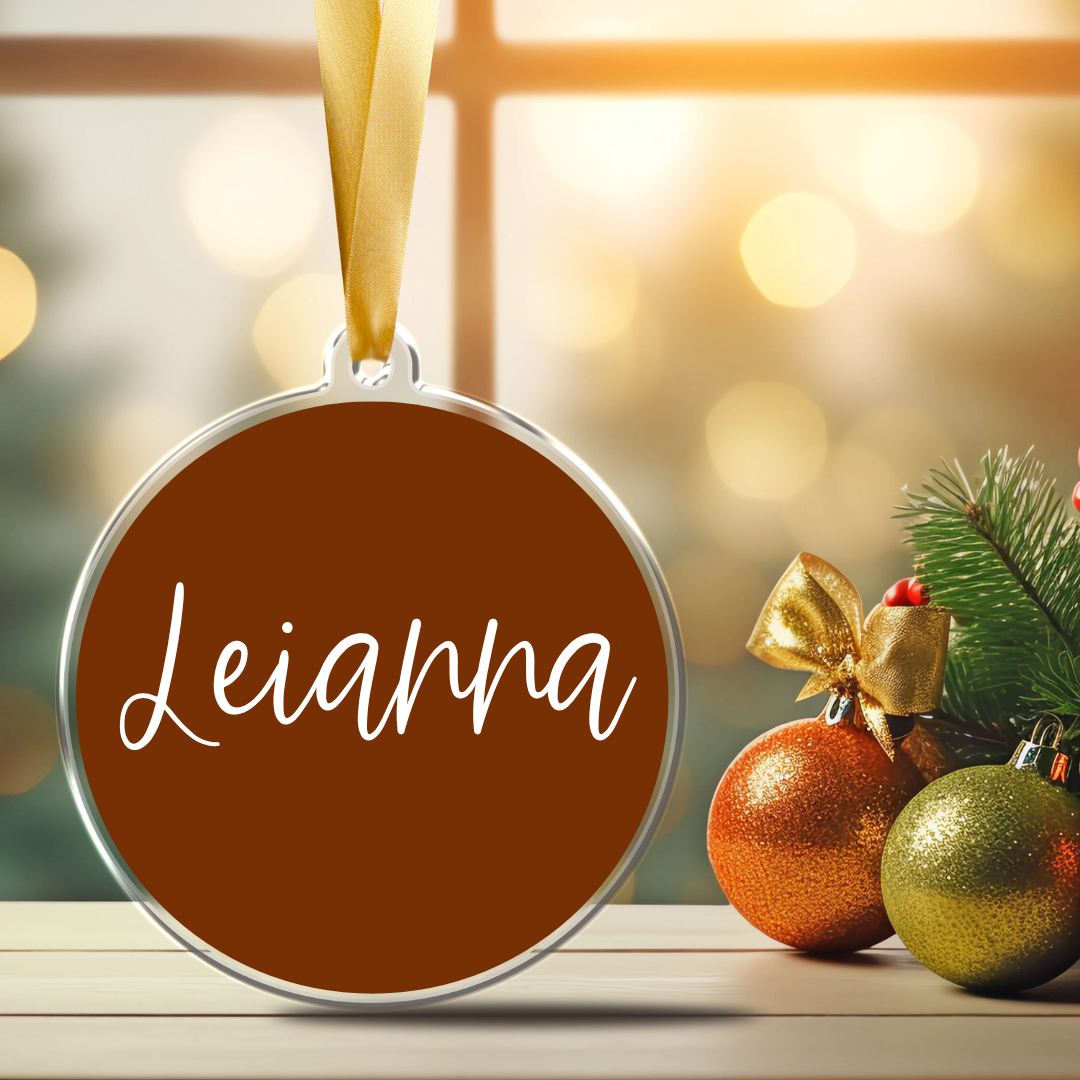 Custom Christmas acrylic ornament personalized with ncursive ame Leianna, gold background and satin ribbon — Simply Aloha On The Go