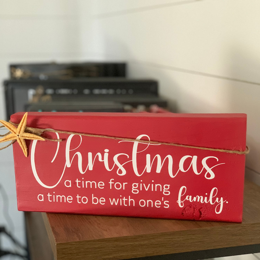 Handcrafted Christmas shelf decor with meaningful holiday quote