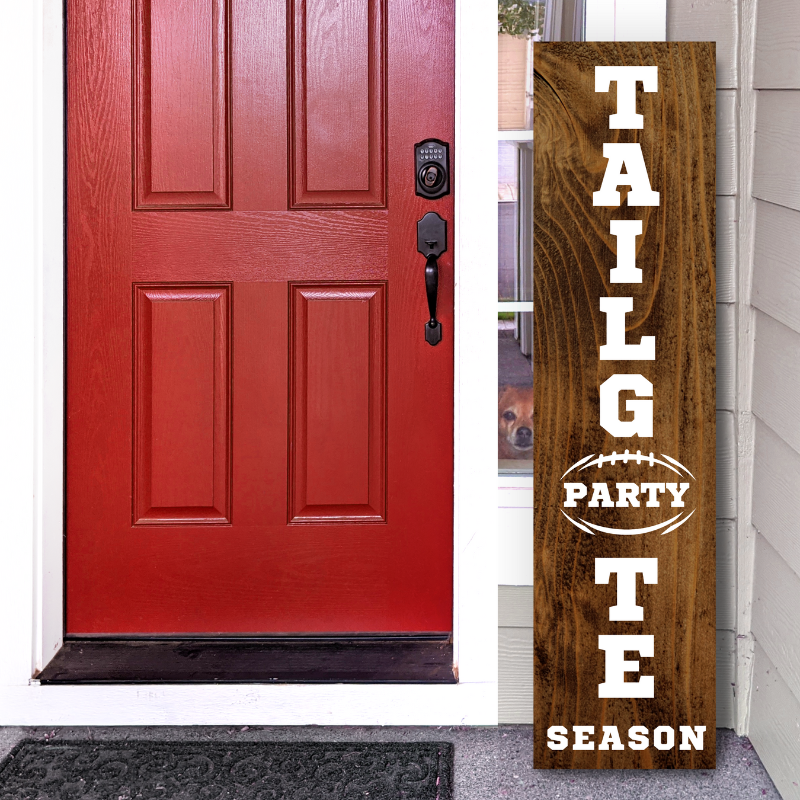 Custom vertical wooden game day sign that reads 'Tailgate Party Season' with a football design, shown on a front porch.
