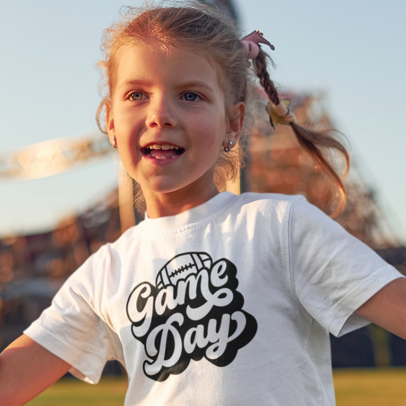 Personalized Kids Girls White Double-Sided T-Shirt featuring a football graphic and game day text on the front and a player number on the back, from Simply Aloha On The Go.