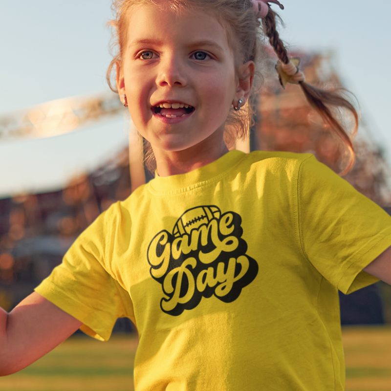 Personalized Kids Girls Yellow Double-Sided T-Shirt featuring a football graphic and game day text on the front and a player number on the back, from Simply Aloha On The Go.