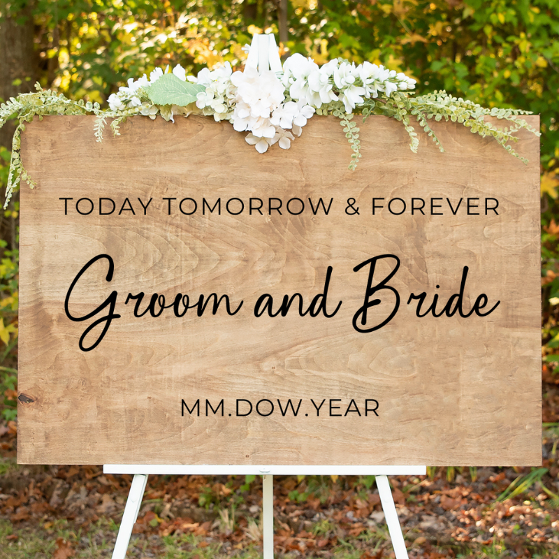 A custom, double-sided wedding welcome sign propped on an easel. The front side features the couple's names and a wedding date, Today Tomorrow And Forever 