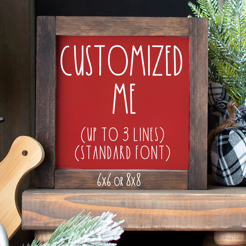 A customizable wooden sign with a red background, perfect for a tiered tray or shelf for any season.