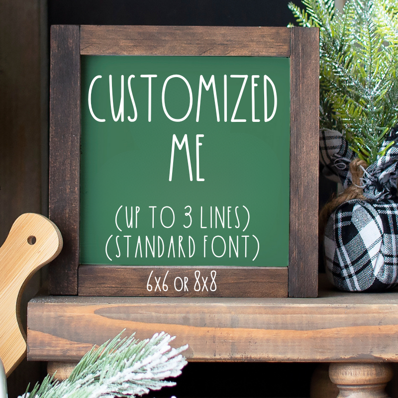 A customizable wooden sign with a green background, perfect for a tiered tray or shelf for any season.