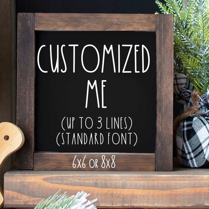 A customizable wooden sign with a black background, perfect for a tiered tray or shelf for any season.