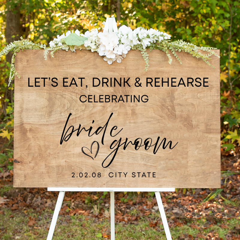 Double Sided Wedding Welcome Sign showing the rustic rehearsal dinner design with Let's Eat, Drink and Rehearse lettering.