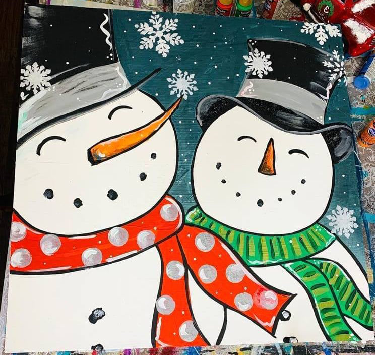 Finished DIY canvas painting featuring two smiling snowmen in red and green scarves.