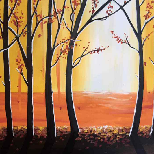 Finished fall forest paint kit canvas with black tree silhouettes against a warm golden orange autumn sky DIY fall paint kit 