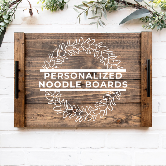 A rustic farmhouse noodle board in stained background, white design color with a beautiful plumeria flower design and a personalized family name, made and designed by Simply Aloha On The Go