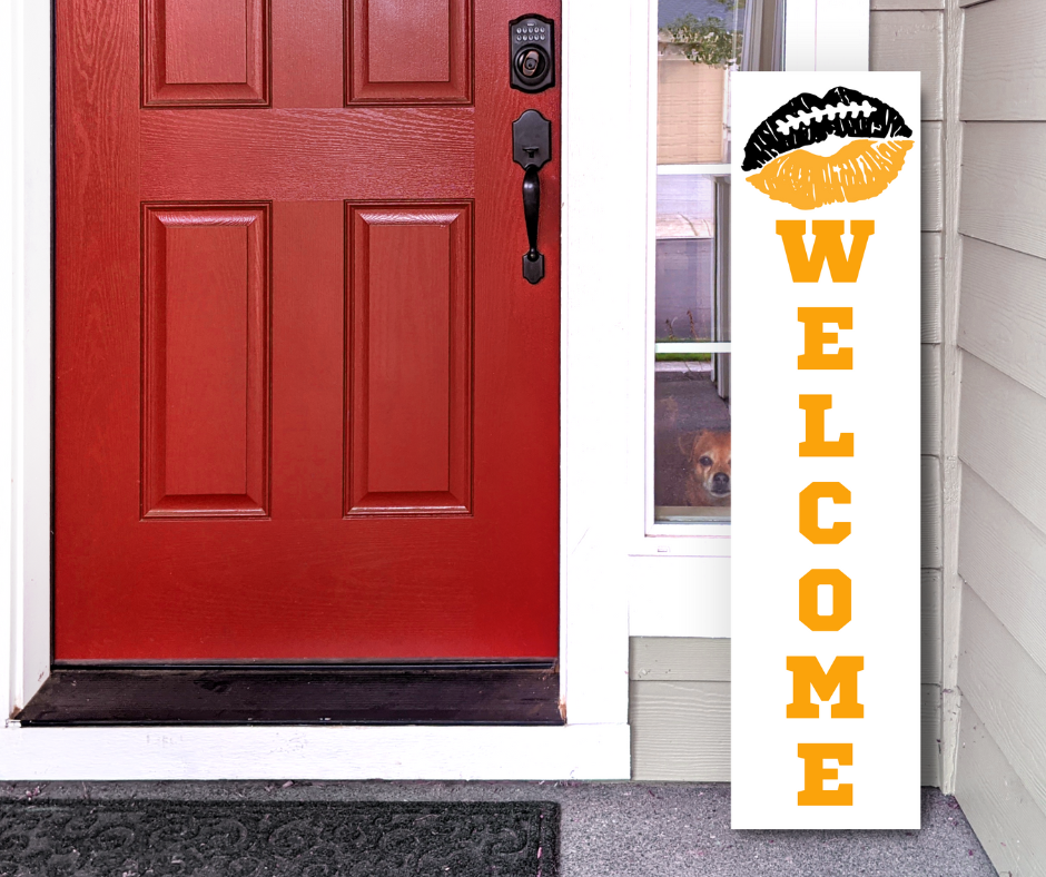 Handcrafted 4ft vertical football sign in black and gold colors. Features a "Lip & Welcome" design. Custom Game Day Decor by Simply Aloha On The Go.