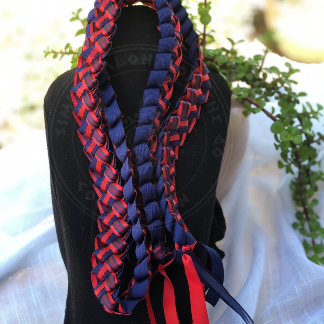 Custom open-ended graduation lei in red and navy blue school colors braided ribbons and hanging tassels.
