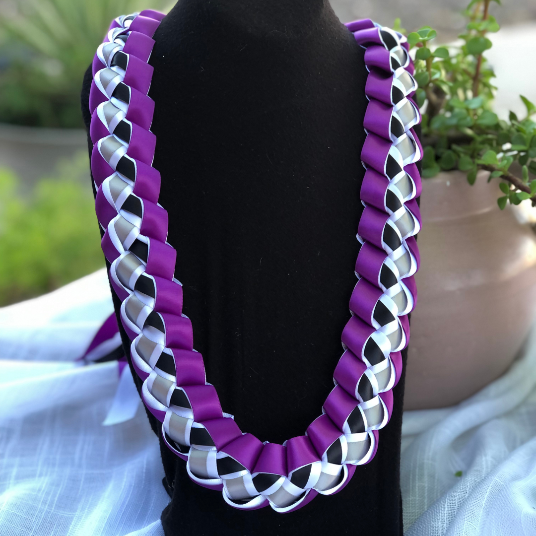 Graduation Lei featuring a braided purple, white, black, and silver-toned ribbon design for high school and college graduates.