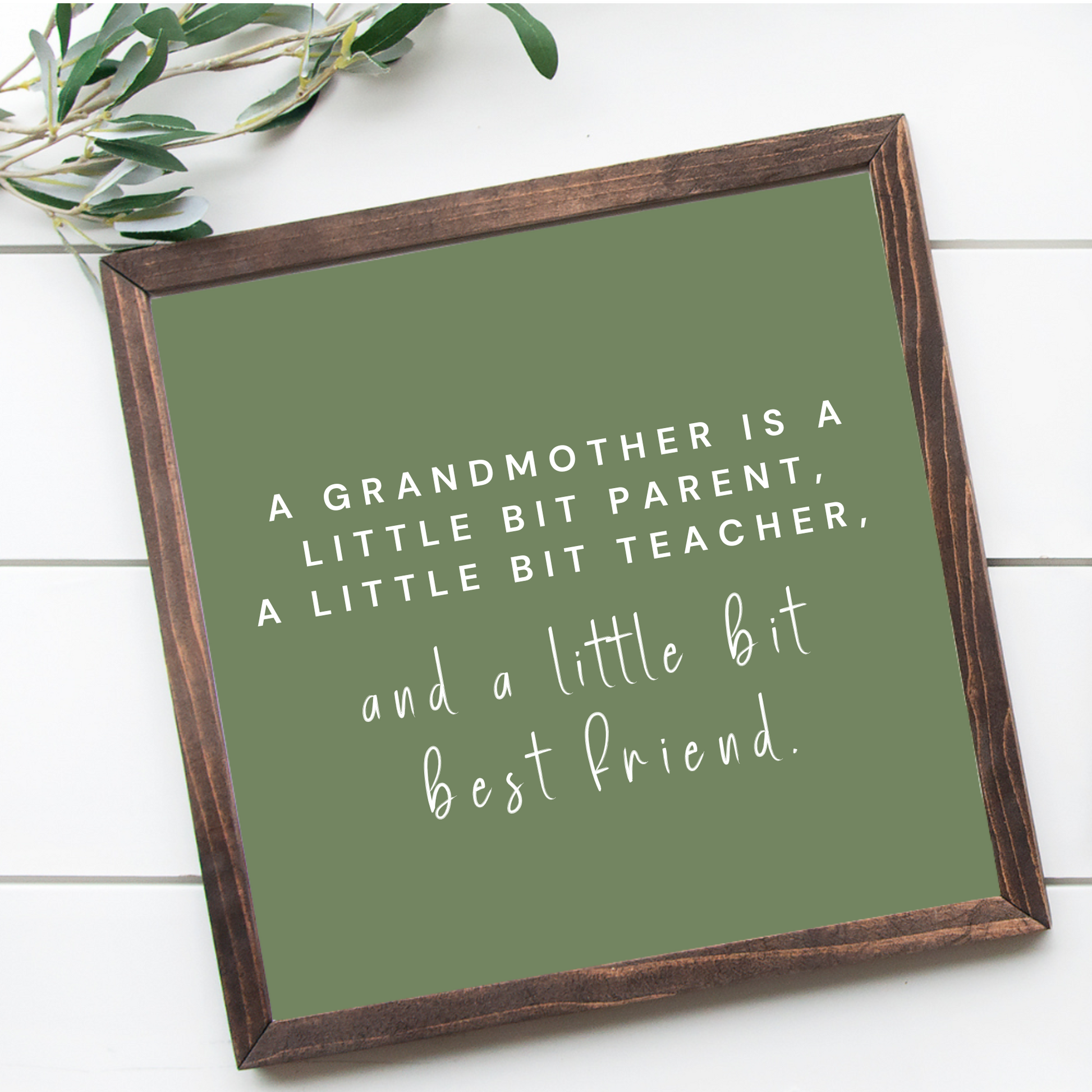 Rustic wood sign with the phrase “Grandmother Is A Bit Parent, A Bit Teacher, and Friend. Perfect gift for her-just because. Sage green backgrouind white font.