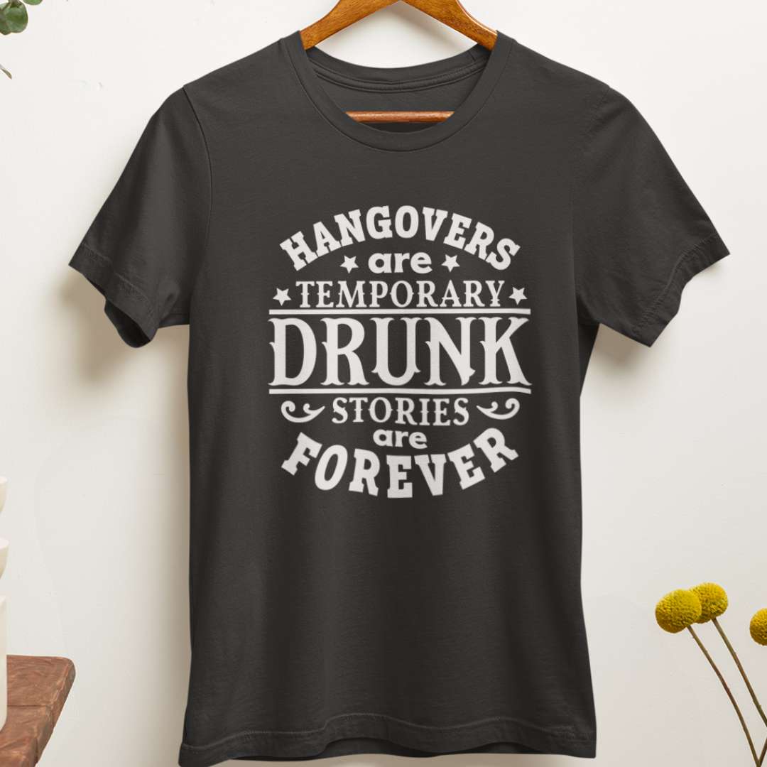 "Hangover Recovery" t-shirt hanging on a wall, a funny shirt for morning after parties. Available in many colors