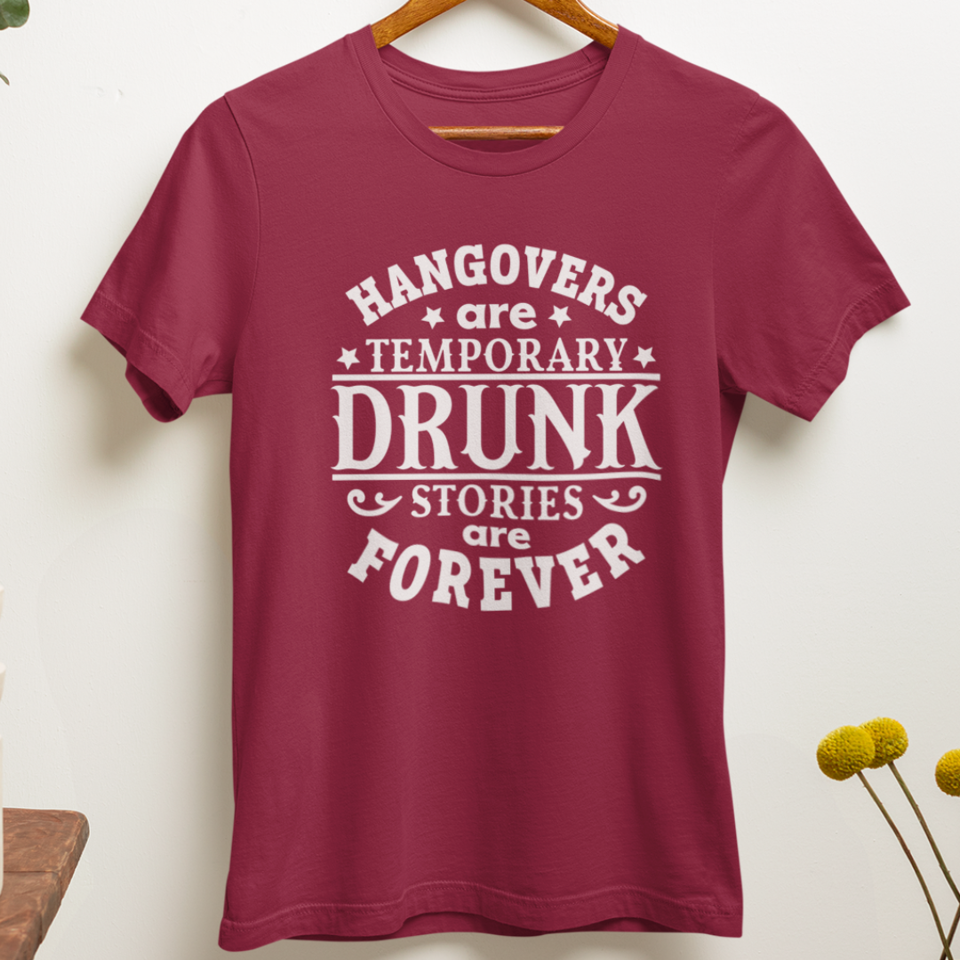 Hangover Recovery T-Shirt In cardinal red hanging on a wall. Funny Graphic Tee for Morning After. Available in many sizes and colors.