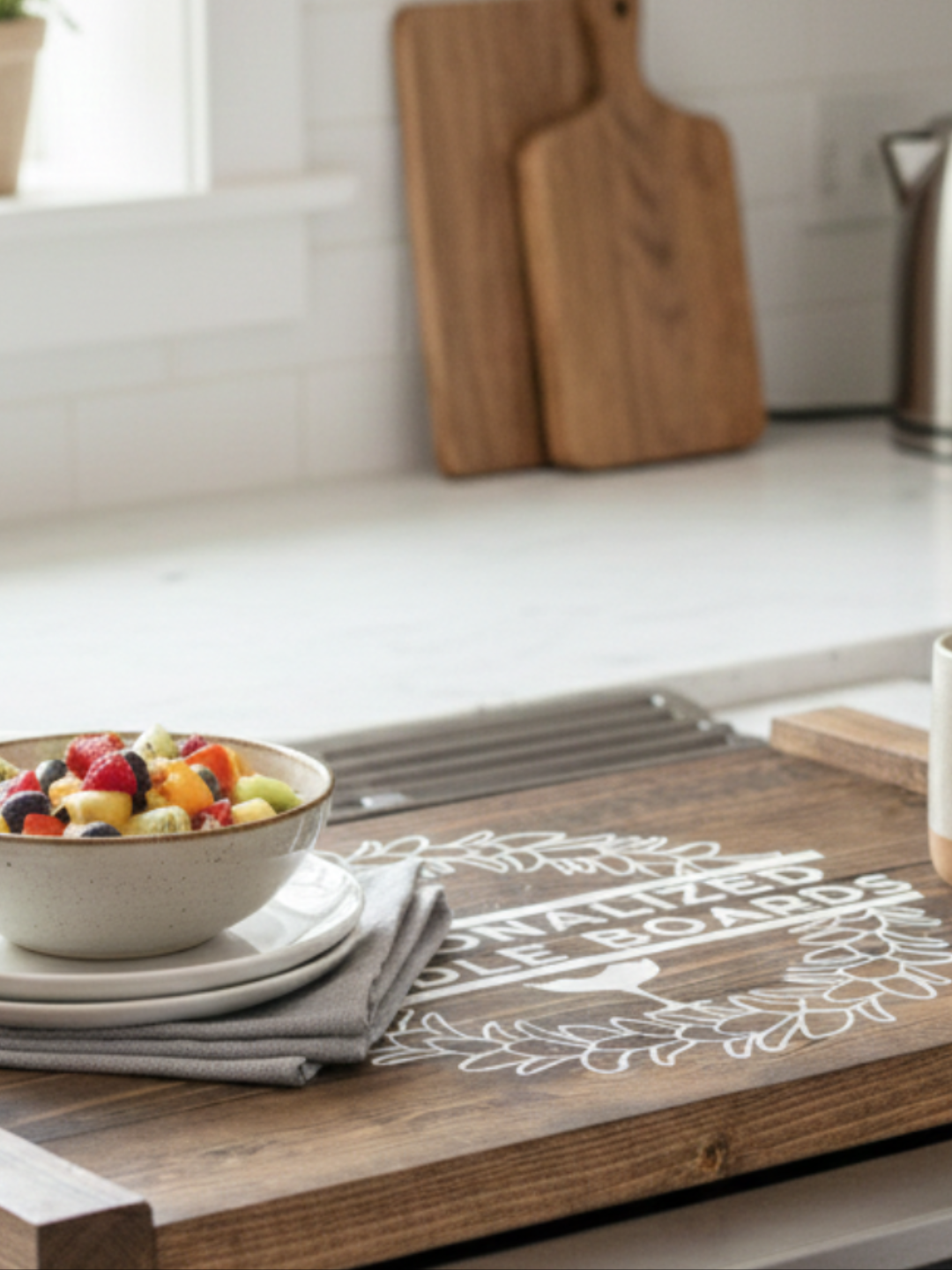 Handcrafted stained wooden noodle board with a white plumeria wreath design used as a stove top cover.
