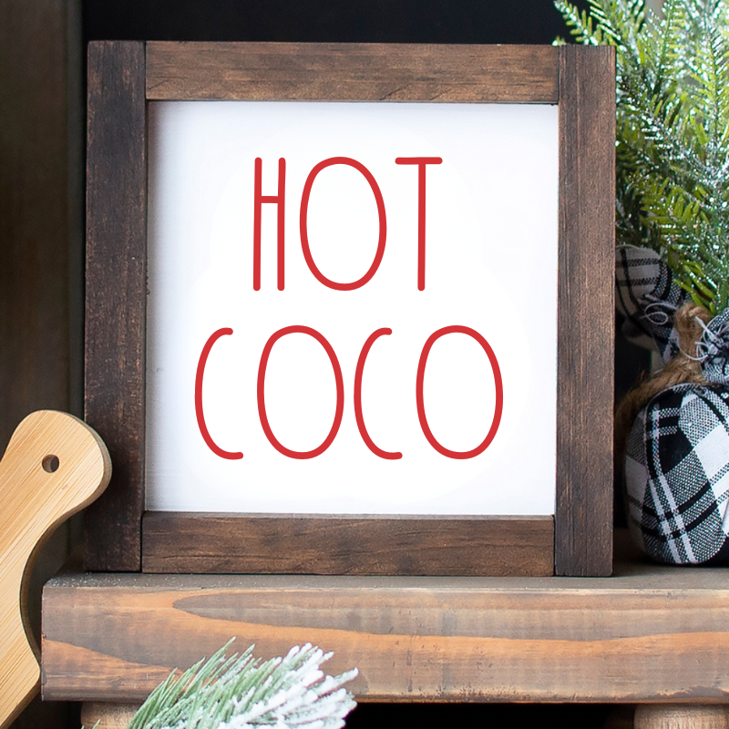 closeup of A 6x6 inch handcrafted wooden sign with "Hot Coco" in red font on a white background, styled on a tiered tray. Cusjtomization available too!