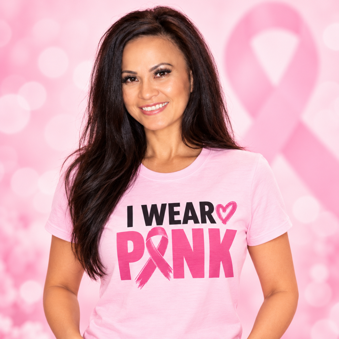 Woman wearing an I Wear Pink breast cancer awareness shirt with pink ribbon design for Breast Cancer Awareness Month.