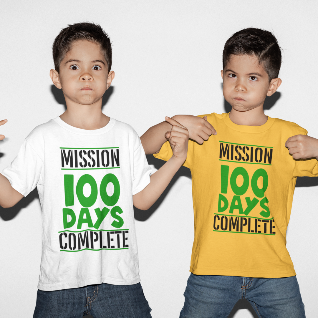 Two boys wearing our Mission 100 Days Cmplete T-Shirts – Fun & Colorful Classroom Tee in white and yellow