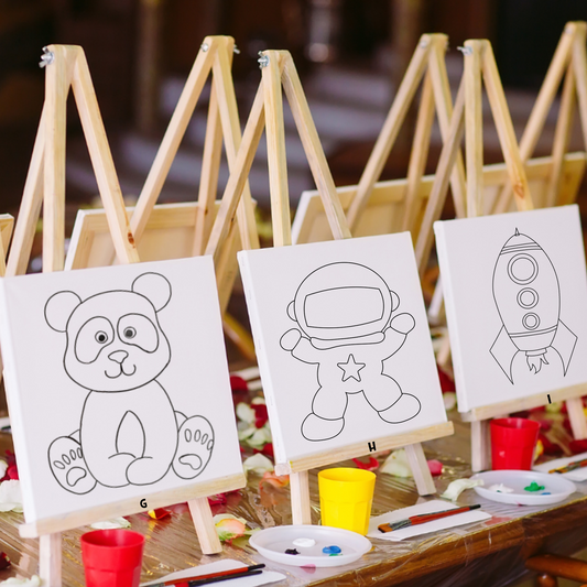 Kids' Astronauts Theme Space Paint Kit showing three realistic space canvases with a rocket ship and astronaut for a birthday party craft.
