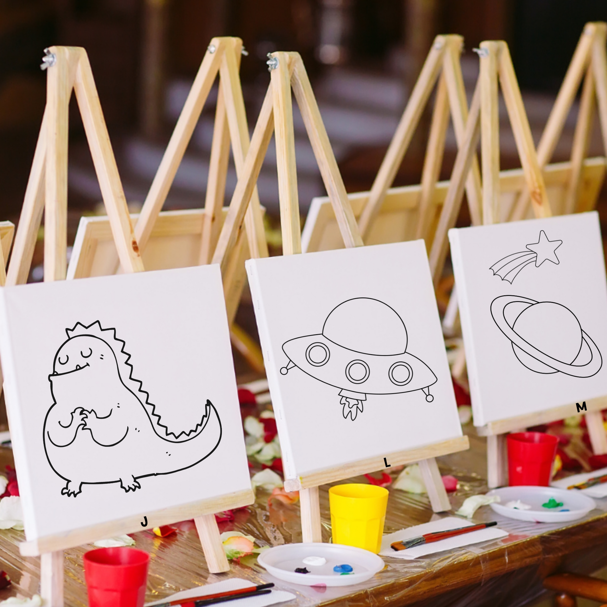 Kids' Cartoons Theme Space Paint Kit showing alien and flying saucer canvases for a fun kids' DIY craft activity.