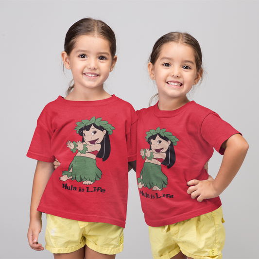Two young girls wearing matching red Simply Aloha On The Go kids hula girl graphic t-shirts.