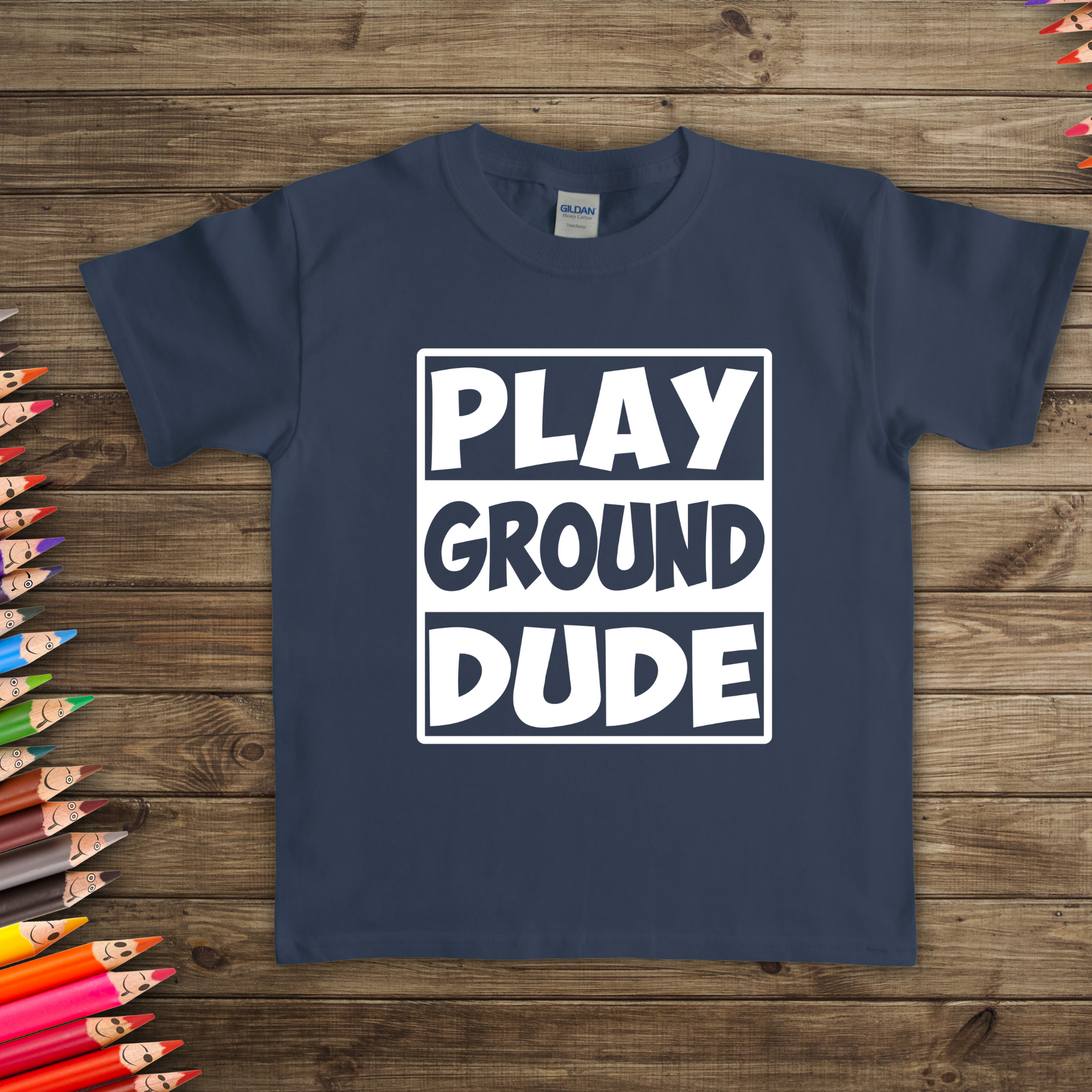 Kids Playground Dude Boys T-Shirt in vibrant colors with a playful design of swings, slides, and merry-go-rounds. Perfect for active play and casual wear.