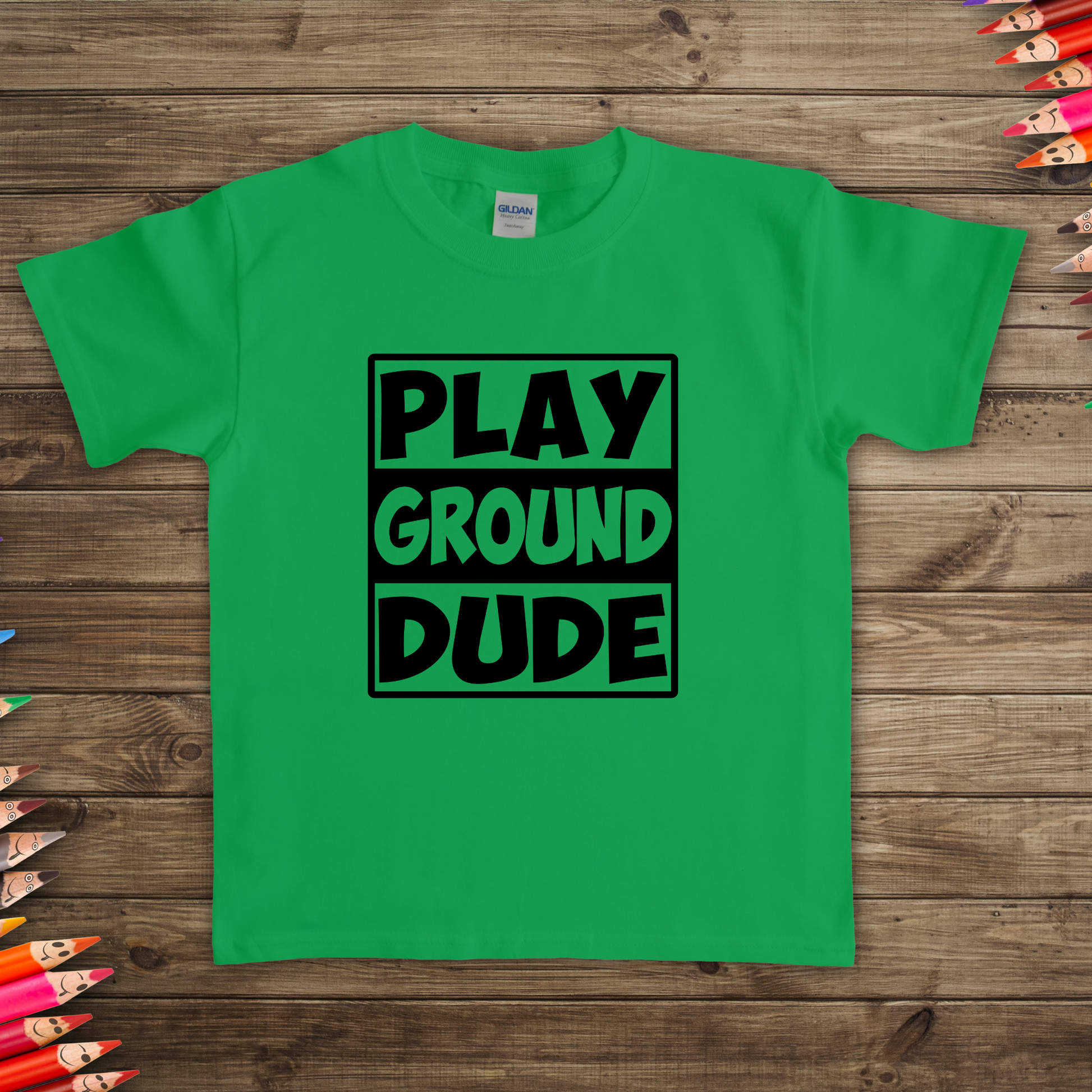 Kids Playground Dude Boys T-Shirt in vibrant colors with a playful design of swings, slides, and merry-go-rounds. Perfect for active play and casual wear.