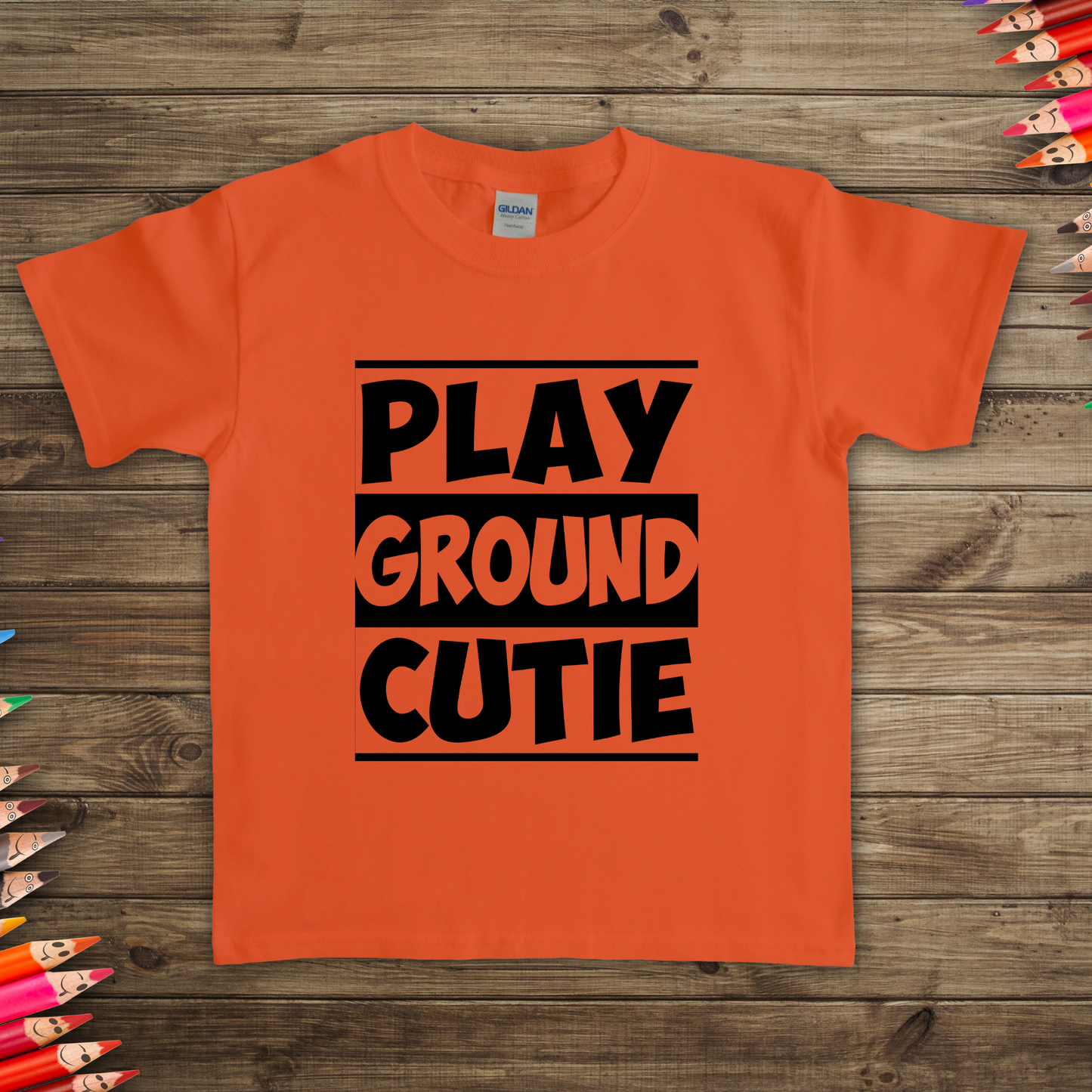 Kids Playground Dude Boys T-Shirt in vibrant colors with a playful design of swings, slides, and merry-go-rounds. Perfect for active play and casual wear.