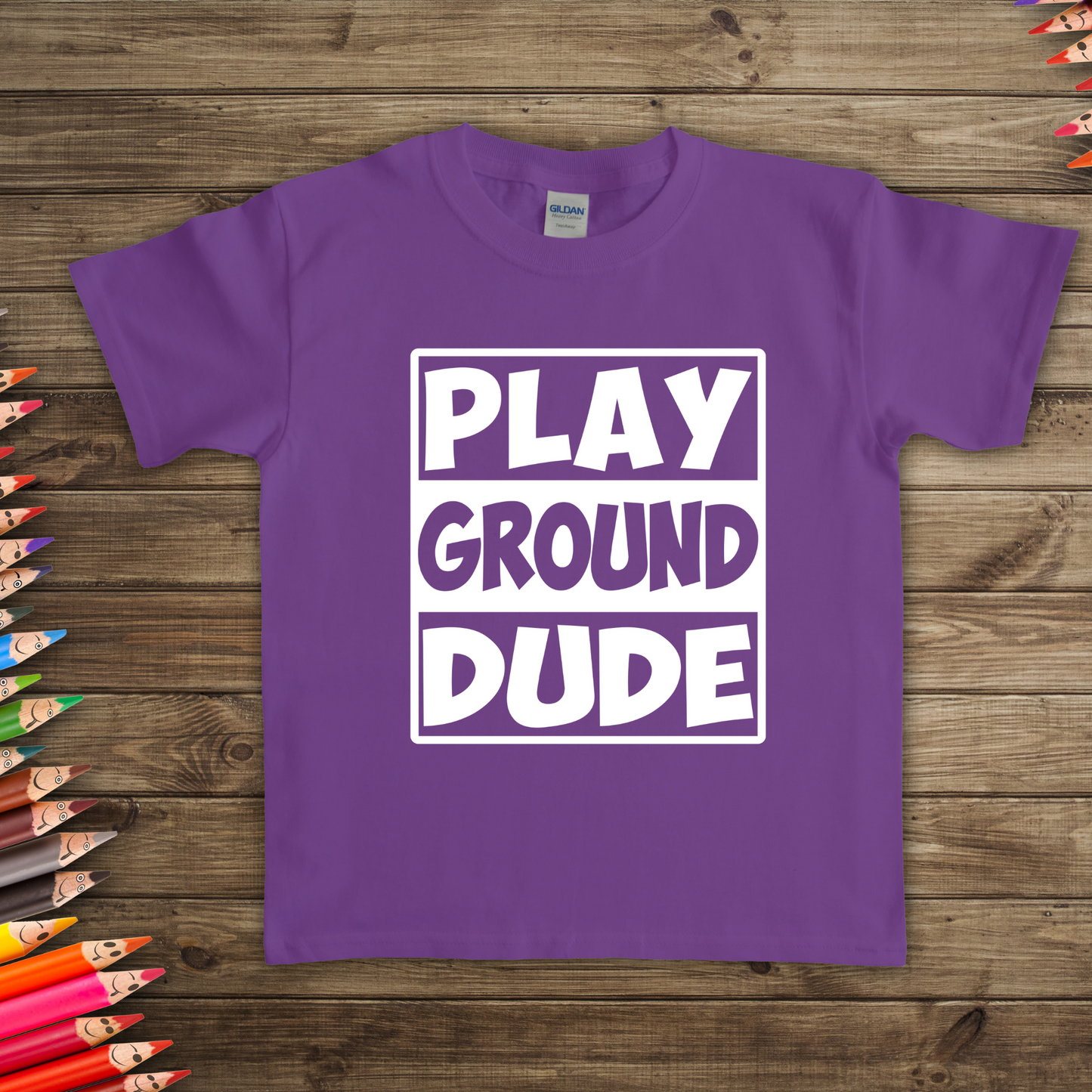 Kids Playground Dude Boys T-Shirt in vibrant colors with a playful design of swings, slides, and merry-go-rounds. Perfect for active play and casual wear.