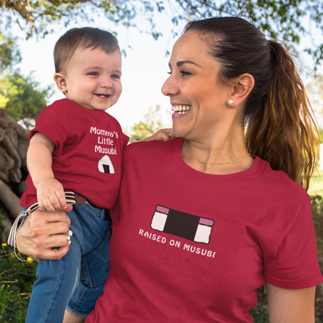 Mom, and toddler son wearing matching family t-shirts Mommy and Me Raised on Musubi Hawaiian t-shirt.