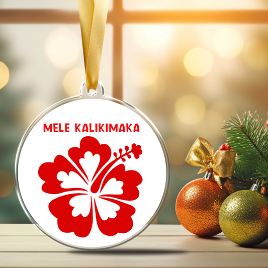 Hawaiian Christmas ornament with hibiscus flower and Mele Kalikimaka message from our ohana to yours