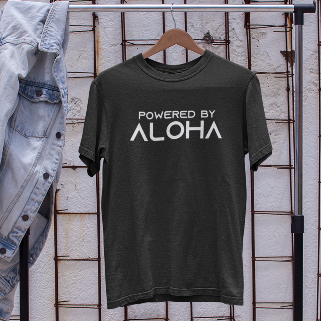 POWERED BY ALOHA Men’s T-Shirt in black with a vibrant Hawaiian text design, island style inspirational tee.