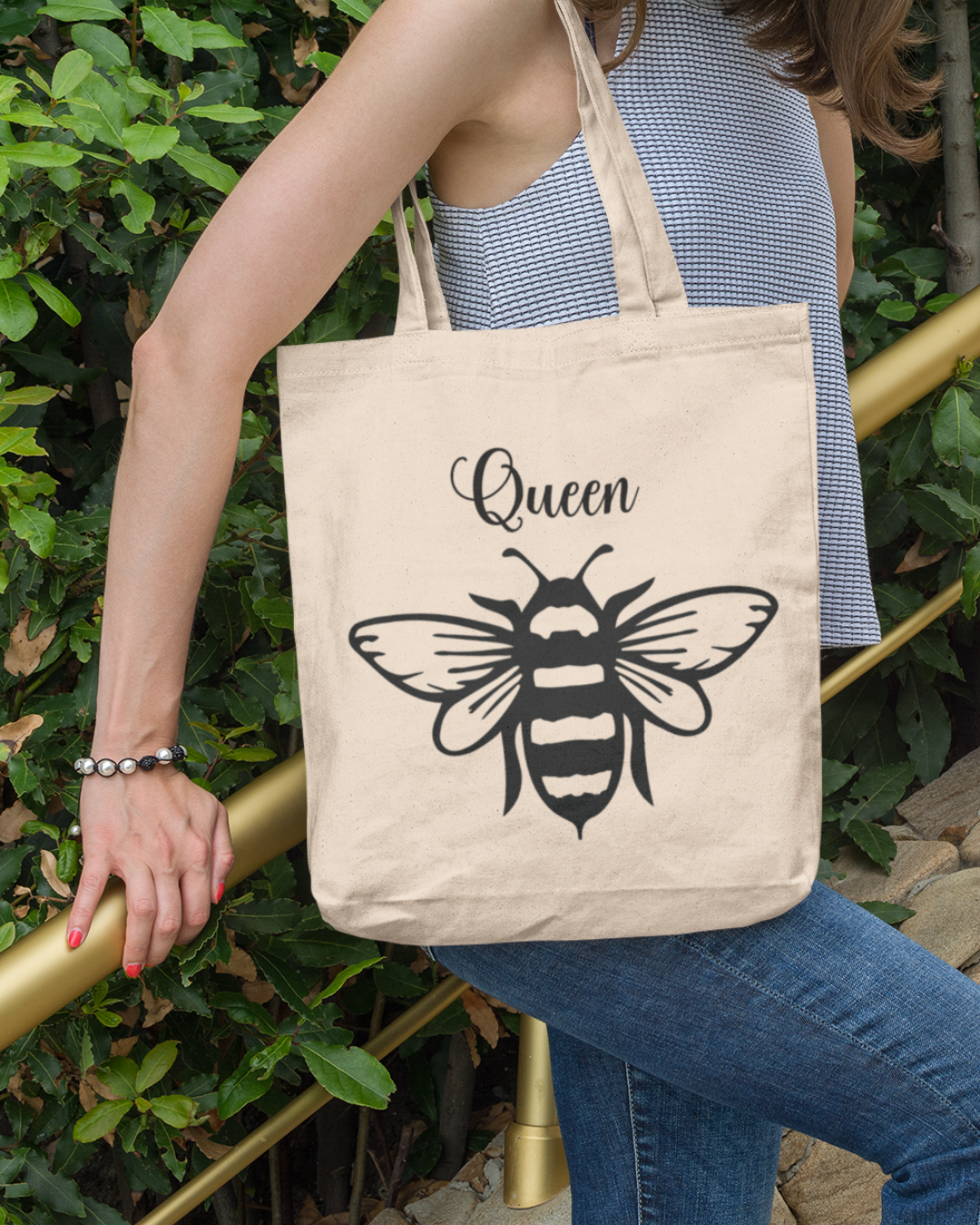 Mom's canvas tote bag featuring Queen lettering above a black bee illustration
