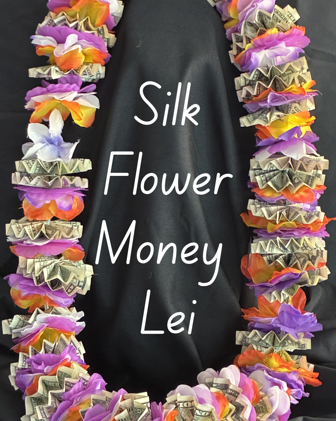 A handcrafted graduation lei featuring vibrant purple and orange silk flowers interspersed with intricately folded US dollar bills, displayed against a black background.