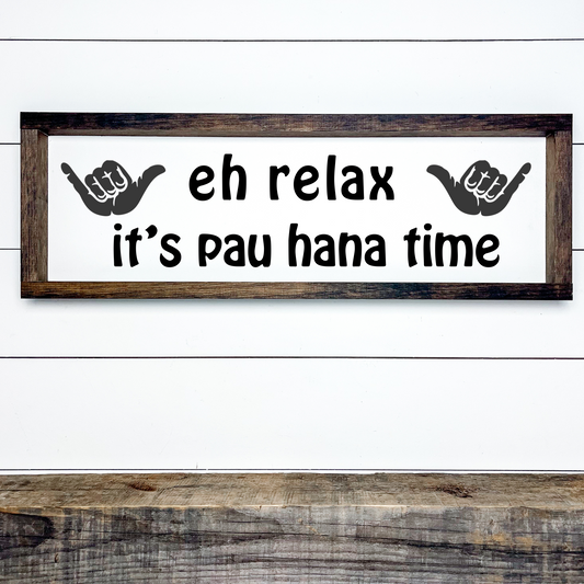 Island style framed wood sign with text “Eh Relax It’s Pau Hana Time” for tropical home bar decor
