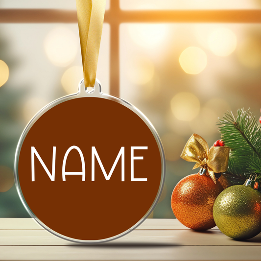Personalized 3-inch clear acrylic name ornament with permanent white vinyl lettering with a satin ribbon and maroon background