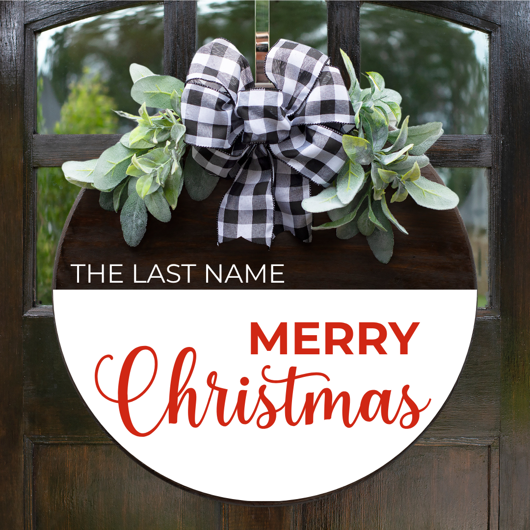 Custom round wooden Christmas door hanger with a holiday red Merry Christmas script, personalized family name