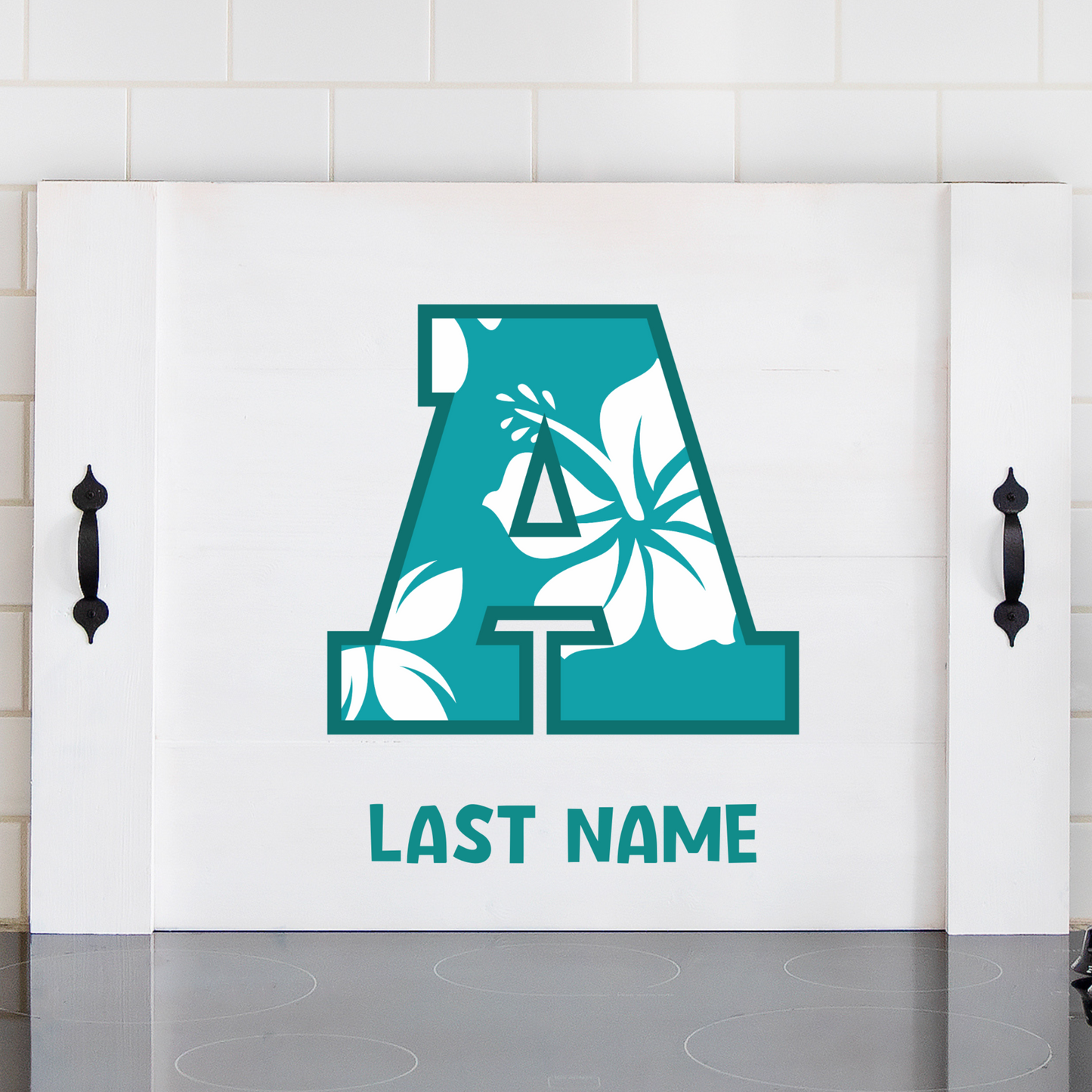 Custom Hawaiian noodle board with family initial and last name, featuring a vibrant hibiscus flower design – personalized kitchen decor with island vibe.