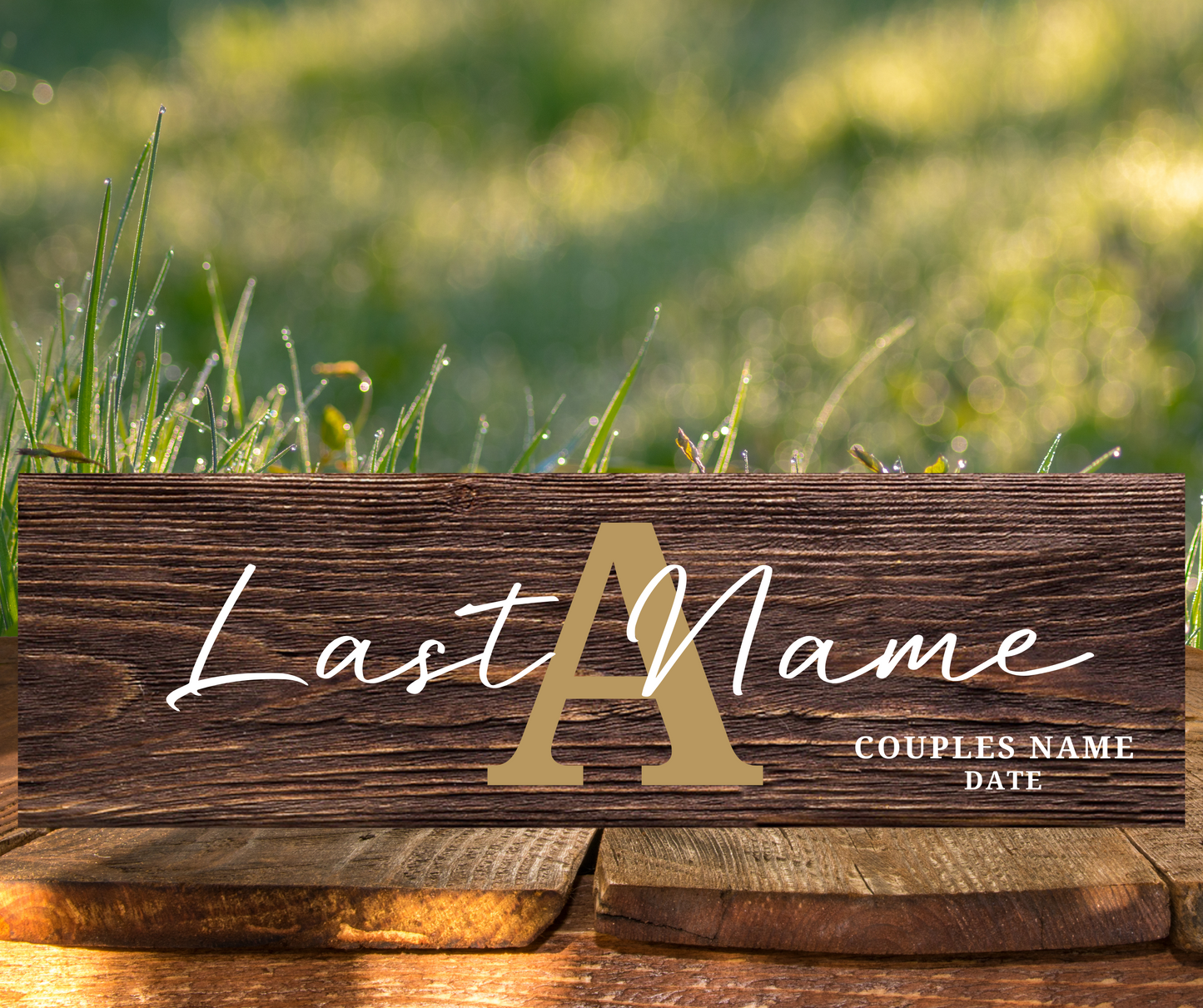 A rustic, 18x6 inch wooden sign with a large engraved monogram and a family name. The sign is propped up on a shelf, showing its natural wood grain and texture