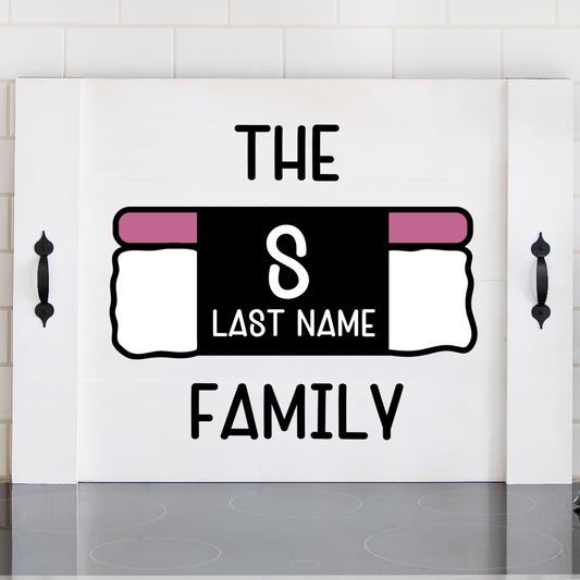 Personalized Hawaiian musubi monogram wooden noodle board used as a custom stove top cover.